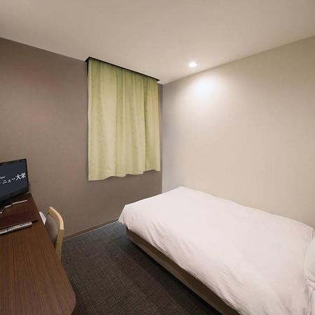 Business Hotel New Daiei Asikaga Kültér fotó