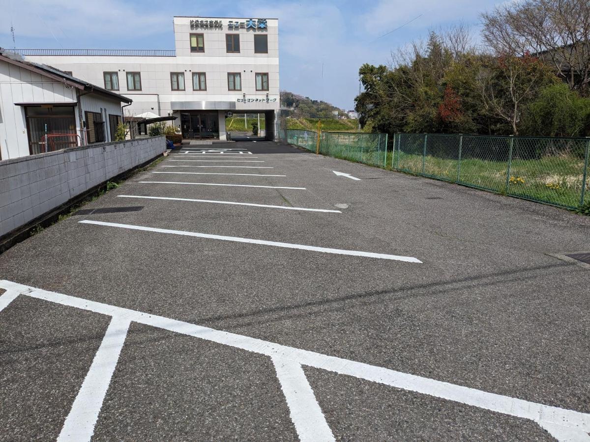 Business Hotel New Daiei Asikaga Kültér fotó