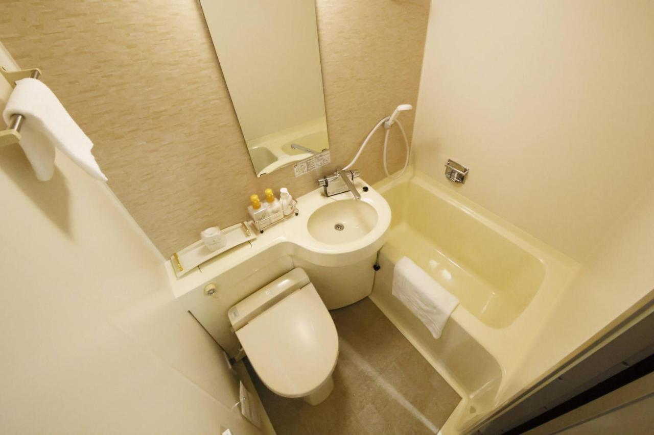 Business Hotel New Daiei Asikaga Kültér fotó