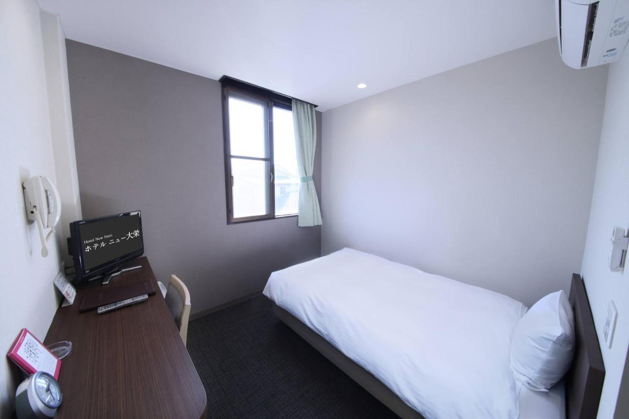 Business Hotel New Daiei Asikaga Kültér fotó
